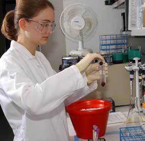 Researcher prepares sample of DNA for testing